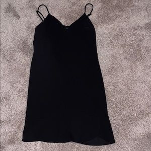Black cocktail dress with a frill on bottom